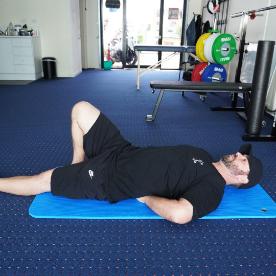Photo of a McGill Curl-up exercise.